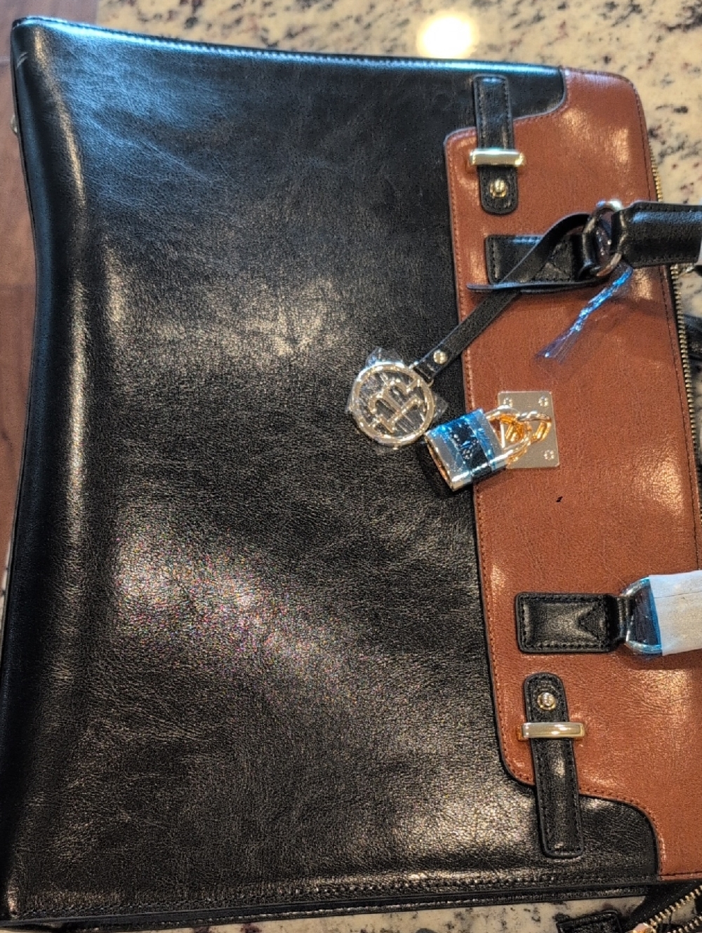 Bostanten Two-Tone Black and Brown Leather Tote with Gold Accent Charm